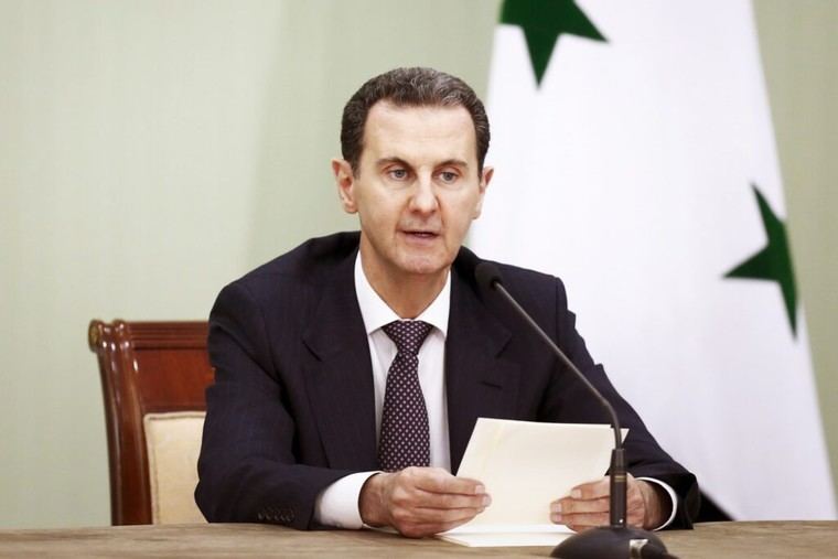 Assad niega haber planeado huir de Siria y afirma que quería seguir luchando